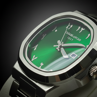 Green watch face with silver casing on a dark background